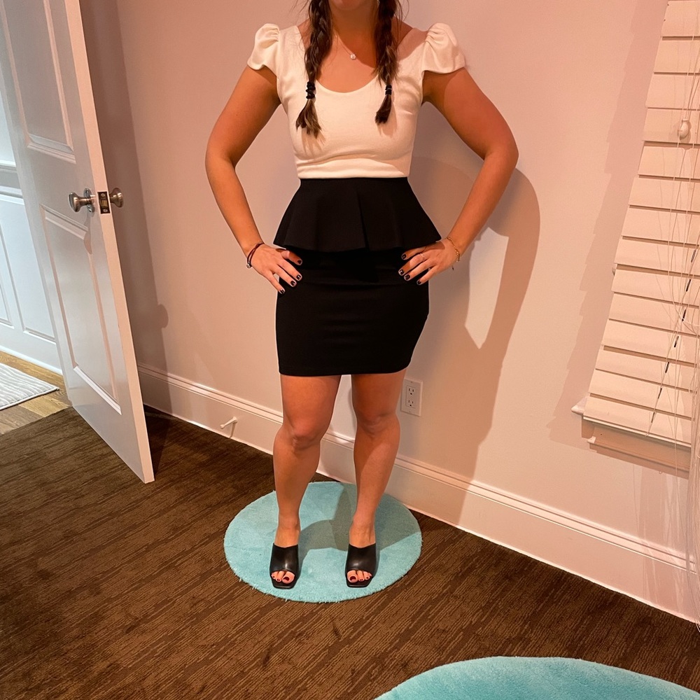 Alice + Olivia Black and White Peplum dress with cap sleeve.
